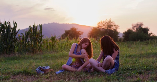 girls checking for insect bites